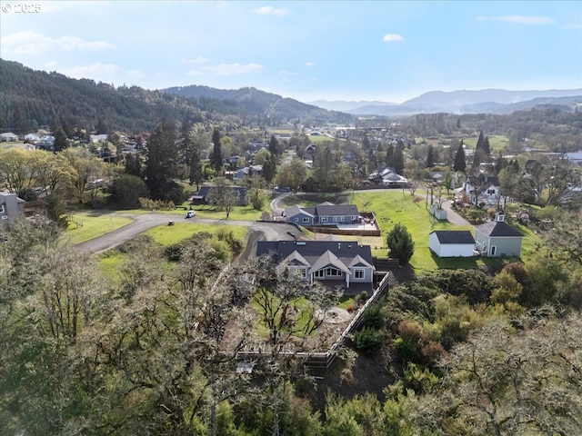 birds eye view of property featuring a mountain view and a residential view