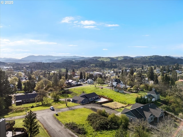 bird's eye view with a residential view and a mountain view