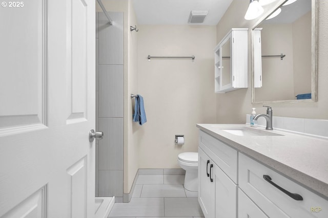 10105 NE 59th St, Vancouver, WA 98662 - bathroom with vanity, toilet, tile patterned floors, and a shower
