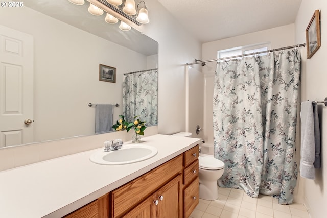 full bathroom with tile patterned floors, toilet, shower / tub combo, and vanity