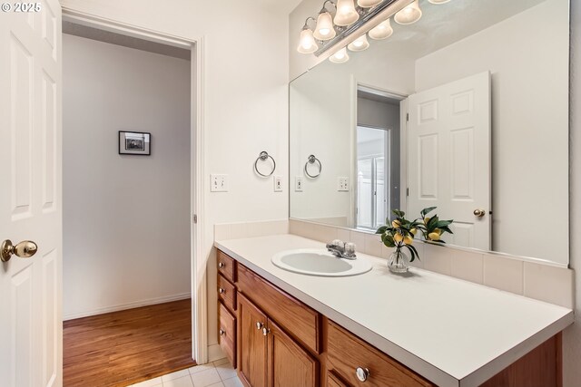 bathroom with vanity and tile patterned floors