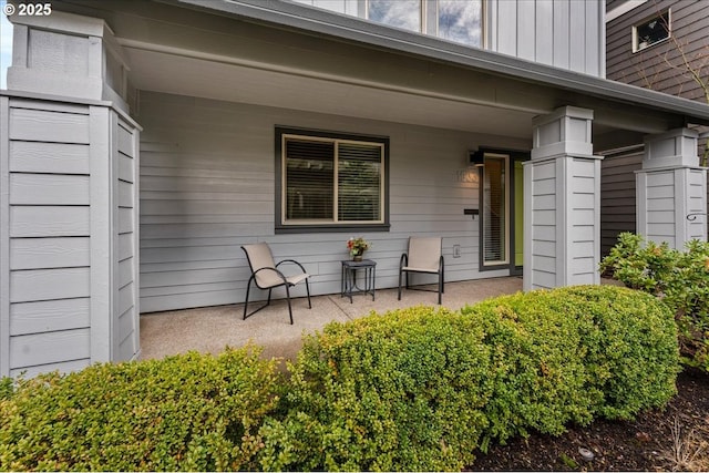 doorway to property featuring a porch