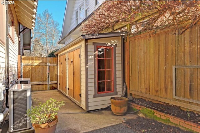 view of outdoor structure with fence