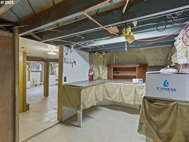 basement with washer / dryer