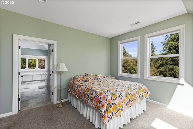 1221 SW Forest Meadows Way, Lake Oswego, OR 97034 - bedroom with carpet floors, multiple windows, and ensuite bath