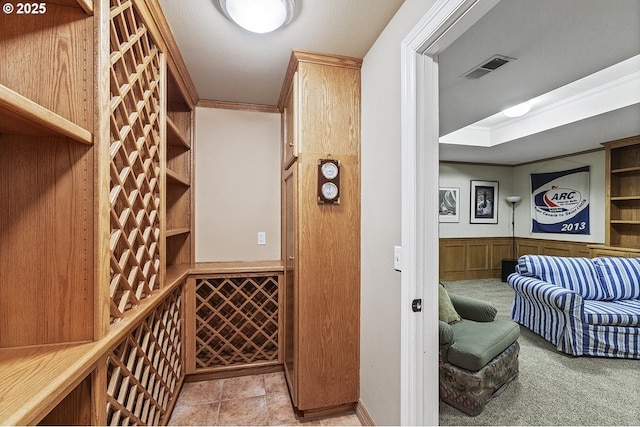 1221 SW Forest Meadows Way, Lake Oswego, OR 97034 - wine room with crown molding and carpet floors