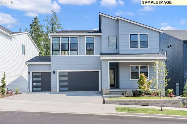 contemporary house with a garage, roof with shingles, and driveway