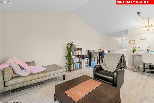 15707 NE Beech St, Portland, OR 97230 - living room with wood finished floors, vaulted ceiling, and a chandelier