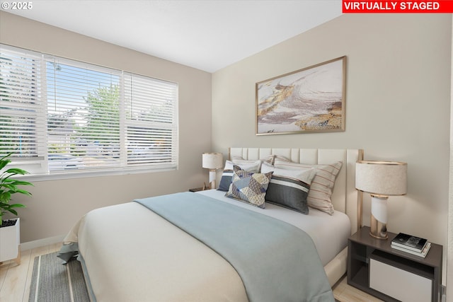 15707 NE Beech St, Portland, OR 97230 - bedroom featuring light wood-style flooring and baseboards