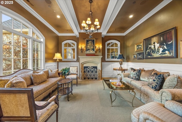 living room with beamed ceiling, ornamental molding, carpet, and a notable chandelier