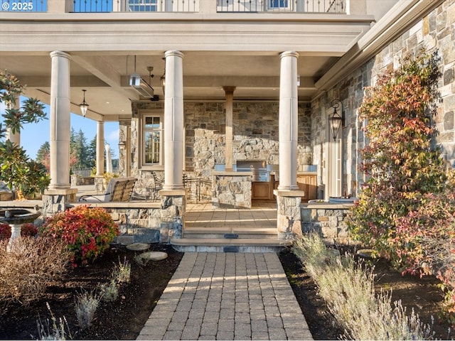 view of patio / terrace featuring a porch and a grill