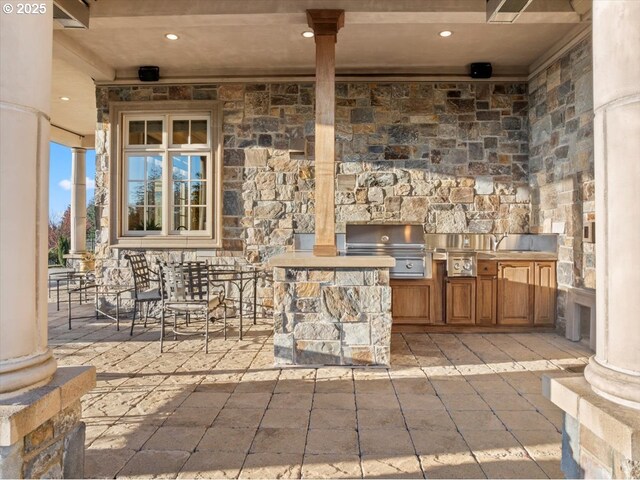 12955 NW Skyline Blvd, Portland, OR 97231 - rear view of property featuring a balcony, a chimney, covered porch, and stone siding