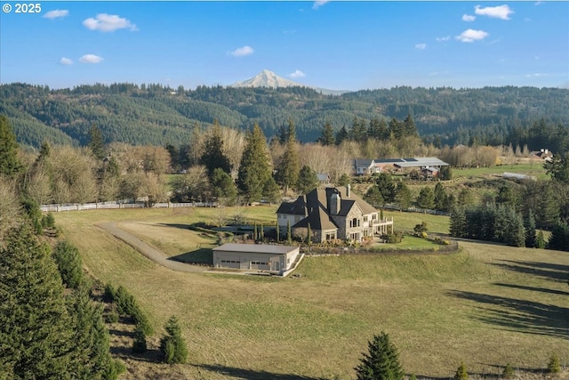 bird's eye view with a mountain view and a rural view