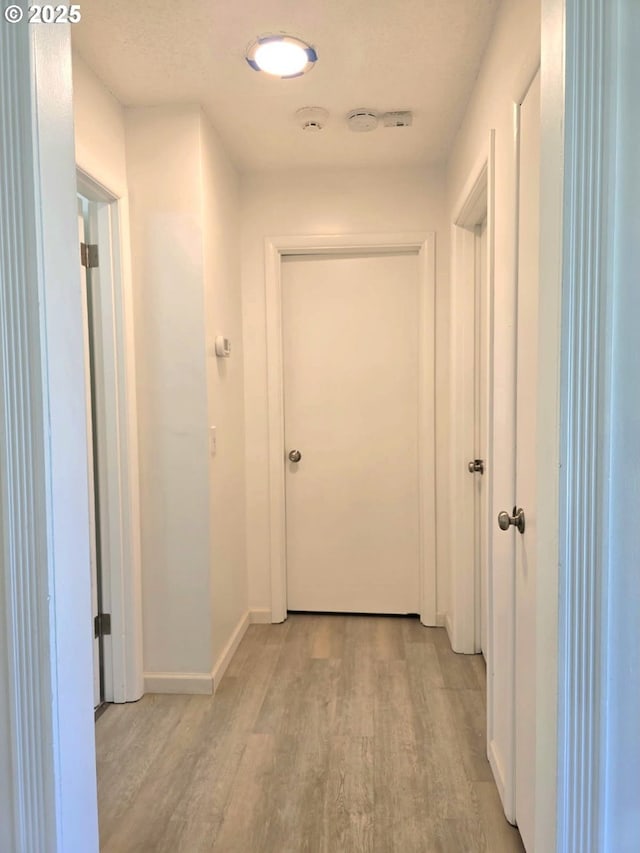6139 SE 103rd Ave, Portland, OR 97266 - corridor featuring light wood-style floors