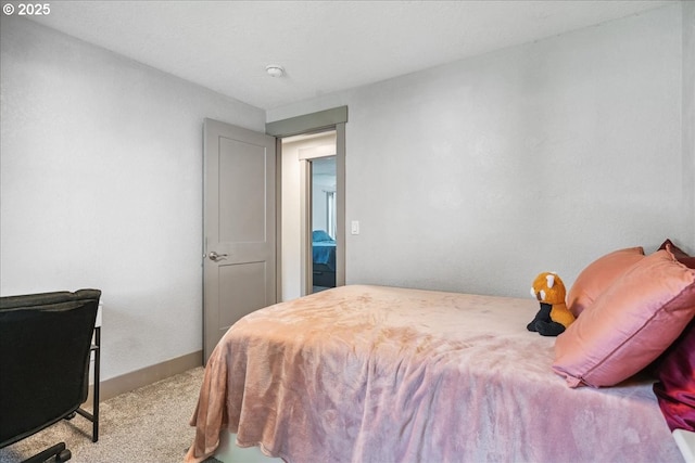bedroom featuring carpet flooring