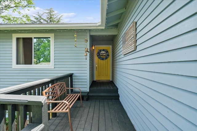 doorway to property featuring a wooden deck