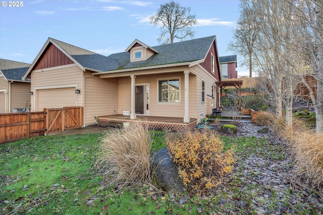 view of front of house with a front lawn and a garage