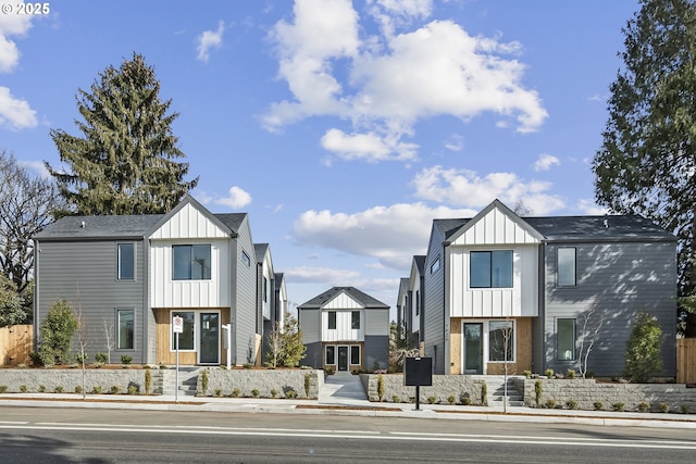 modern inspired farmhouse featuring board and batten siding