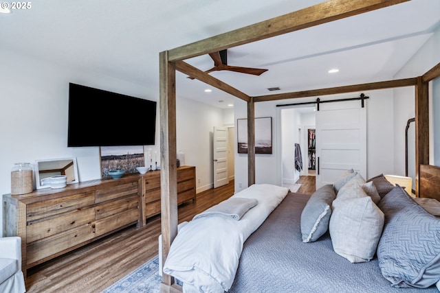 12703 NE 58th Ave, Vancouver, WA 98686 - bedroom with wood finished floors, recessed lighting, and a barn door