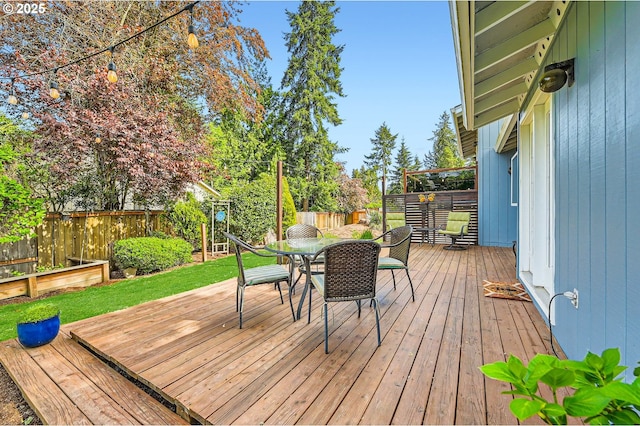 4388 NW Neskowin Ave, Portland, OR 97229 - deck with a fenced backyard and outdoor dining space