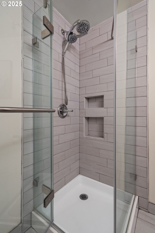 full bathroom featuring a stall shower