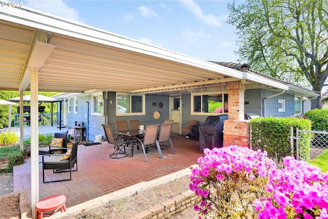 view of patio / terrace with fence and outdoor dining area