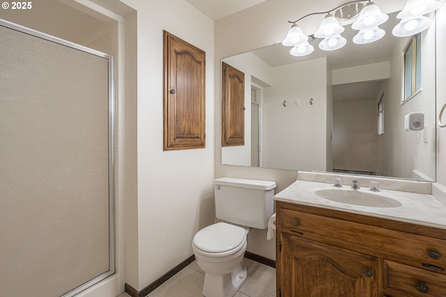 bathroom with tile patterned floors, vanity, toilet, and an enclosed shower