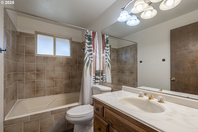 full bathroom featuring shower / bath combo, vanity, and toilet