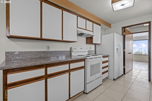 kitchen featuring white cabinetry, white appliances, and light tile patterned floors