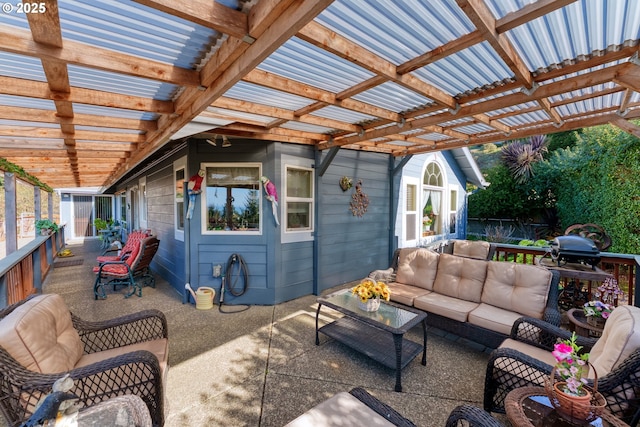 view of patio / terrace featuring an outdoor living space and a pergola