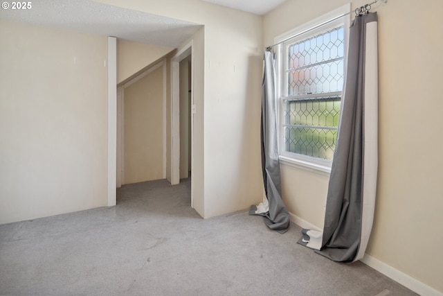 full bathroom with toilet, a stall shower, and vanity