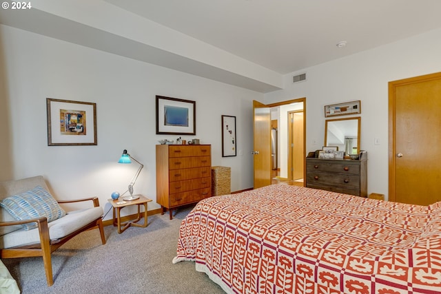 carpeted bedroom with baseboards and visible vents