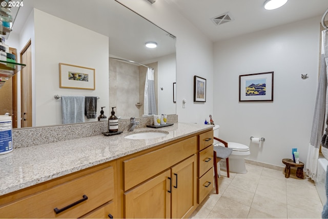 bathroom featuring visible vents, tile patterned flooring, vanity, baseboards, and a shower with curtain