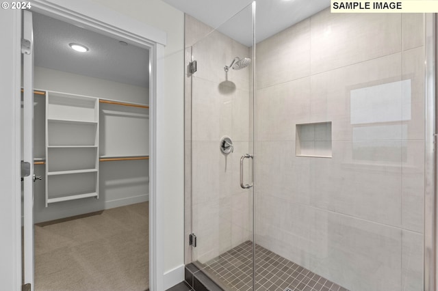 4206 NE 188th St Lot 328, Vancouver, WA 98686 - full bath featuring a shower stall, baseboards, and a walk in closet