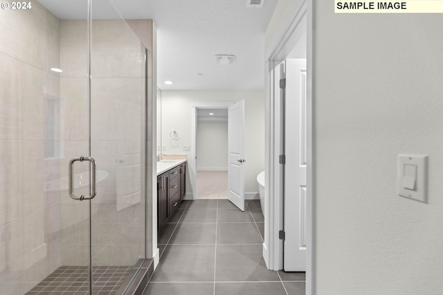 4206 NE 188th St Lot 328, Vancouver, WA 98686 - bathroom with a shower stall, tile patterned flooring, vanity, and recessed lighting