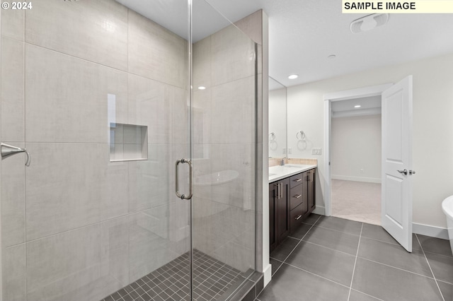 4206 NE 188th St Lot 328, Vancouver, WA 98686 - full bathroom with vanity, baseboards, tile patterned flooring, and a stall shower