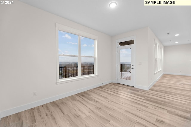 4206 NE 188th St Lot 328, Vancouver, WA 98686 - unfurnished room featuring light wood-type flooring, baseboards, and recessed lighting
