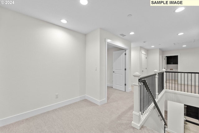 4206 NE 188th St Lot 328, Vancouver, WA 98686 - hall featuring recessed lighting, baseboards, visible vents, light carpet, and an upstairs landing