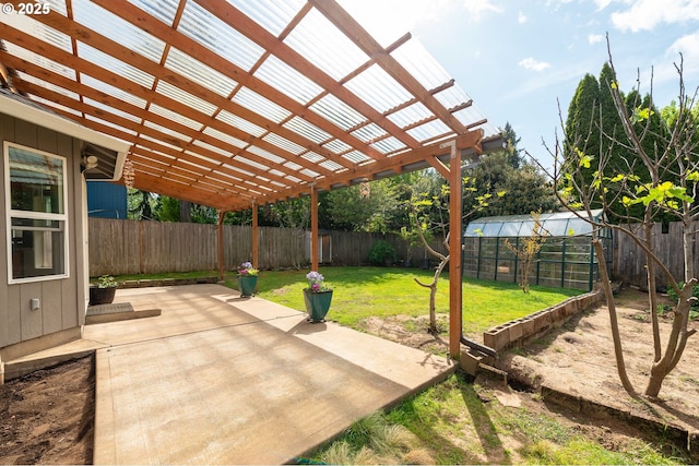 view of patio with a pergola and a fenced backyard