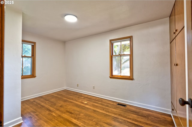3406 E 12th St, Vancouver, WA 98660 - unfurnished room featuring dark wood-type flooring and healthy amount of natural light