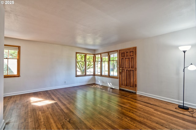 3406 E 12th St, Vancouver, WA 98660 - spare room featuring dark wood finished floors and baseboards