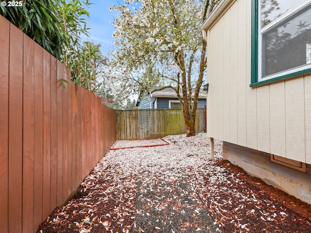 view of yard featuring a fenced backyard