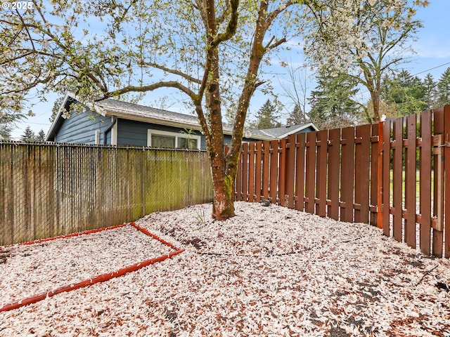 view of yard featuring a fenced backyard