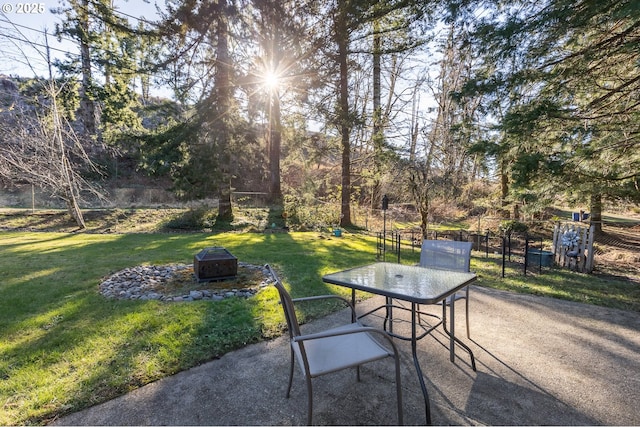 view of patio featuring a fire pit