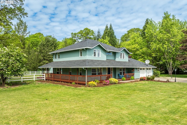 country-style home with covered porch, concrete driveway, an attached garage, and roof with shingles