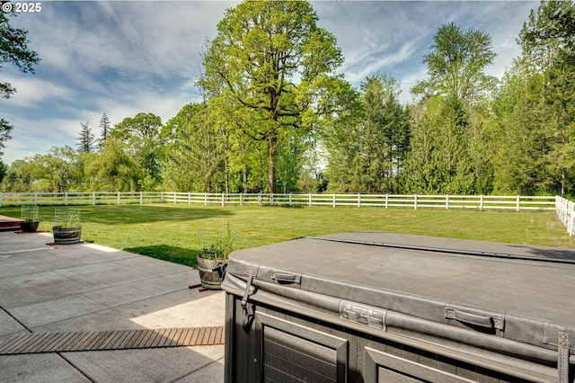 view of patio / terrace featuring a hot tub