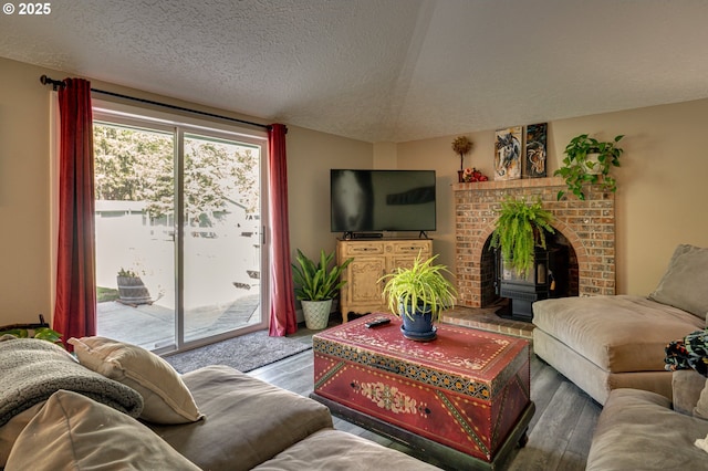 living room featuring wood finished floors and a textured ceiling