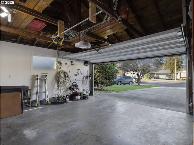 garage featuring a garage door opener