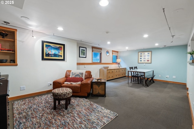 living room with recessed lighting and baseboards