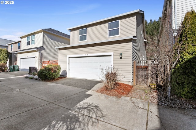 front of property with a garage